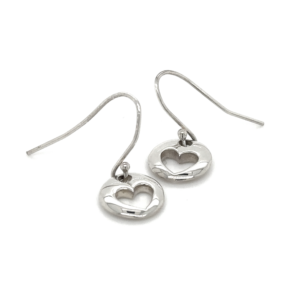 A pair of Super Silver Round Heart Cutout Earrings made of .925 silver, displayed on a white background.