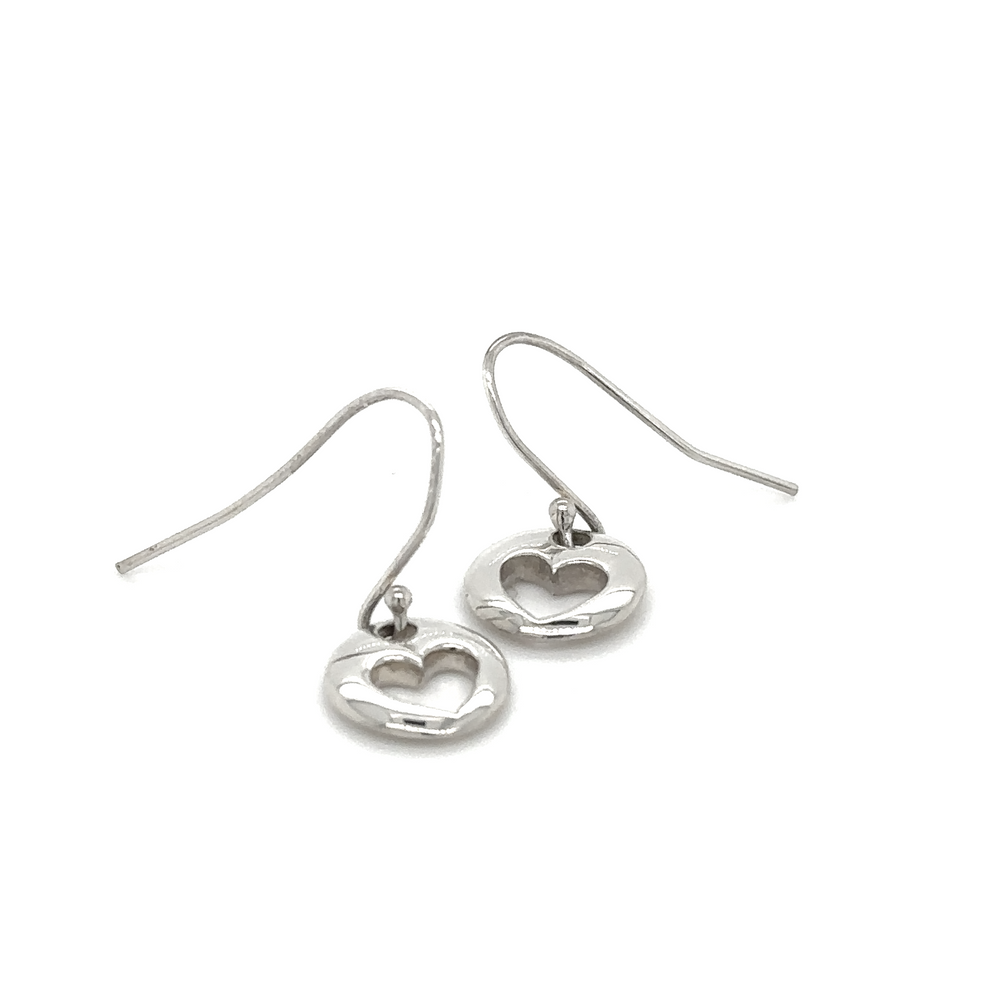 A pair of Super Silver Round Heart Cutout earrings on a white background.