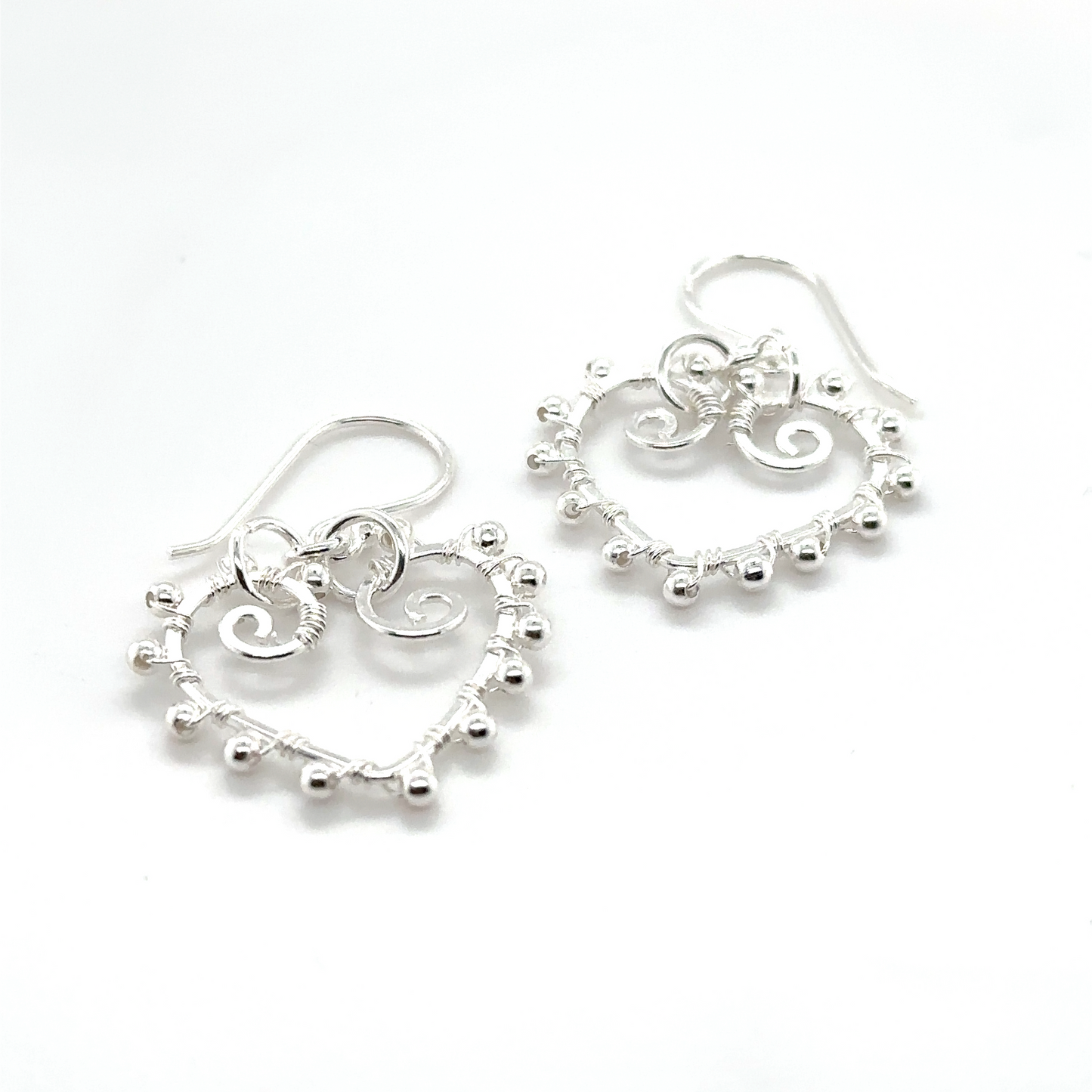 A pair of lightweight Heart Earrings With Silver Beads by Super Silver, perfect for everyday wear, showcased against a white background.