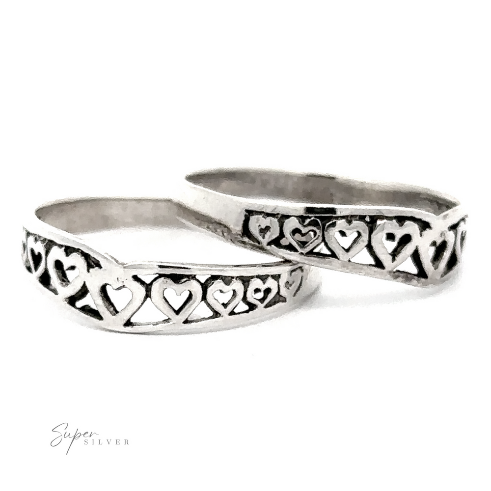 Two Chevron Shaped Rings Lined with Hearts displayed on a white background.
