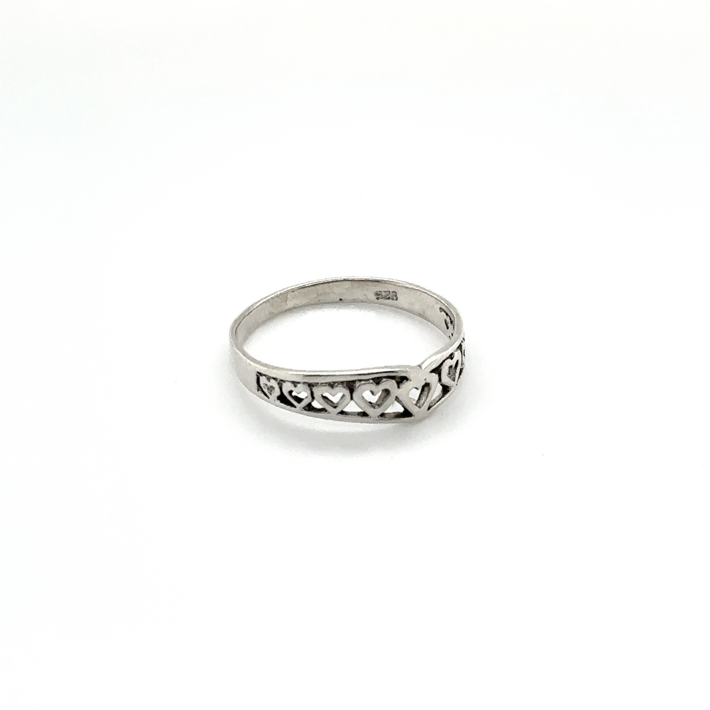 
                  
                    A Chevron Shaped Ring Lined with Hearts, perfect for expressing love or as an engagement ring.
                  
                
