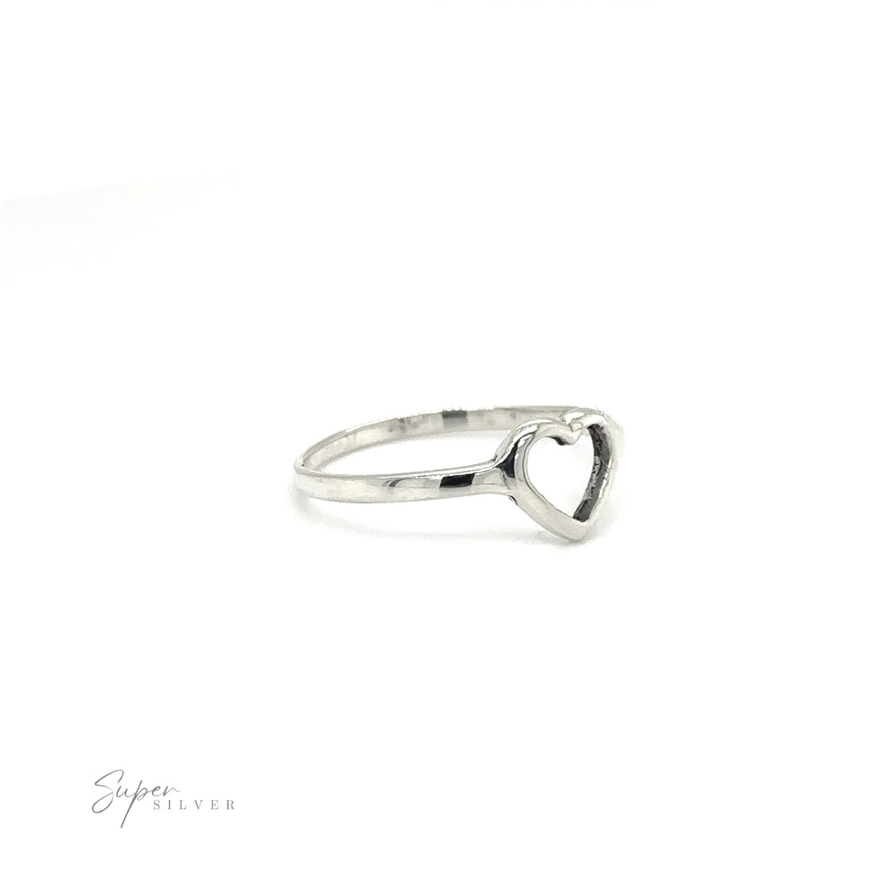 
                  
                    A delicate heart outline ring, perfect for expressing love, set against a clean white background.
                  
                