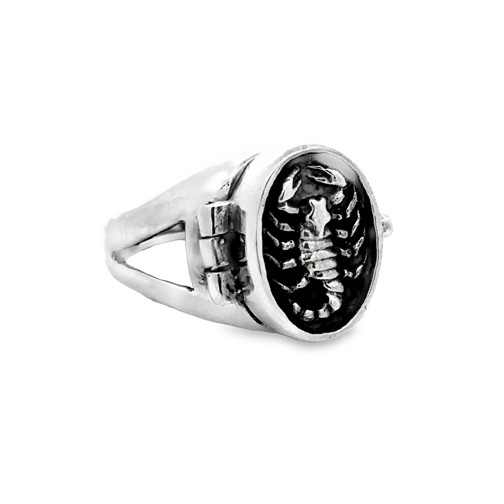 
                  
                    Scorpion Poison Ring with a black circular face featuring a scorpion design, crafted from .925 Sterling Silver.
                  
                