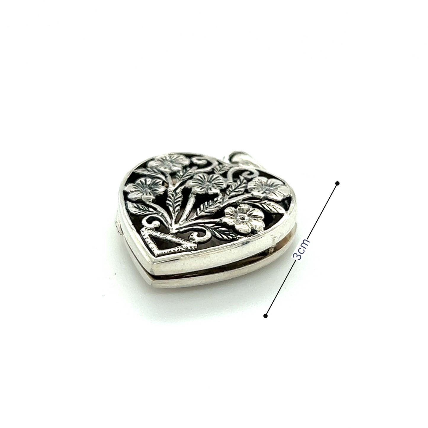 
                  
                    A Super Silver Floral Heart Shaped Locket with an ornate floral design.
                  
                