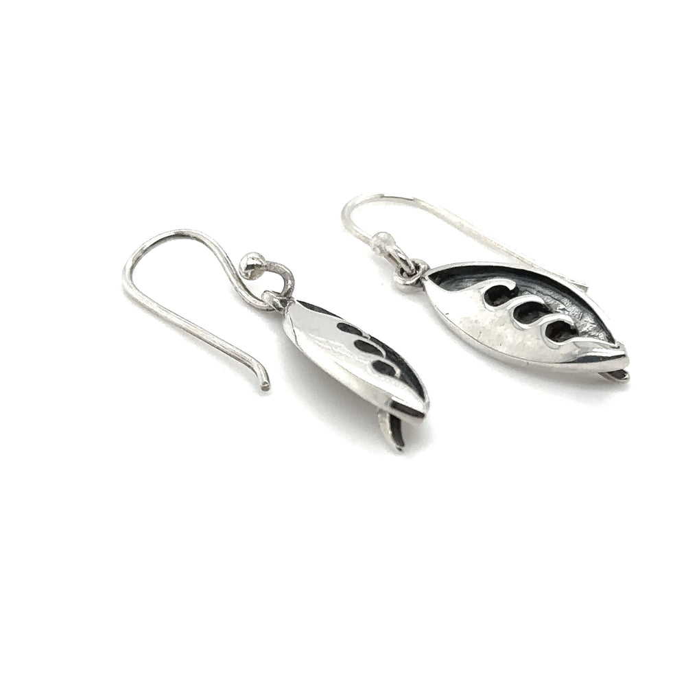 A pair of Super Silver Surfboard Earrings with etched wave detail and sterling silver french hooks.