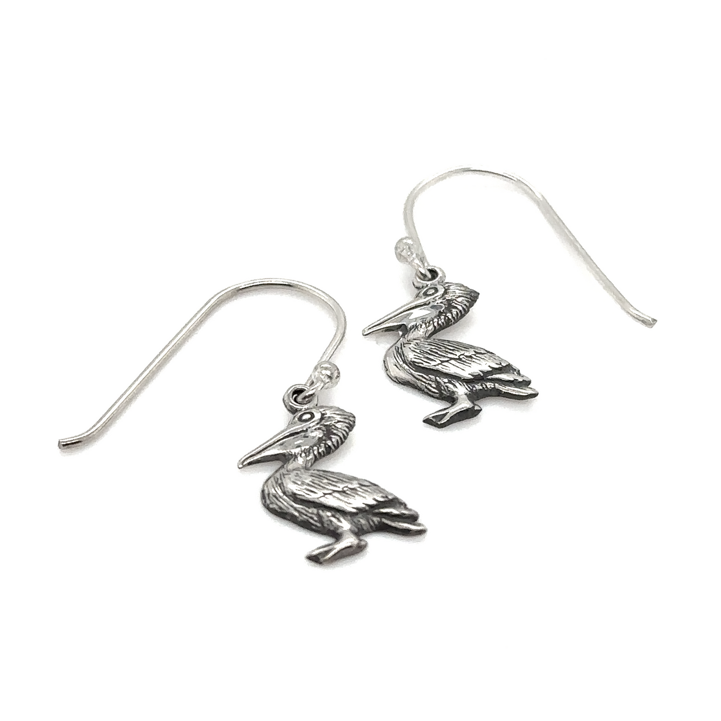 A pair of majestic Super Silver Pelican Earrings on a white background.