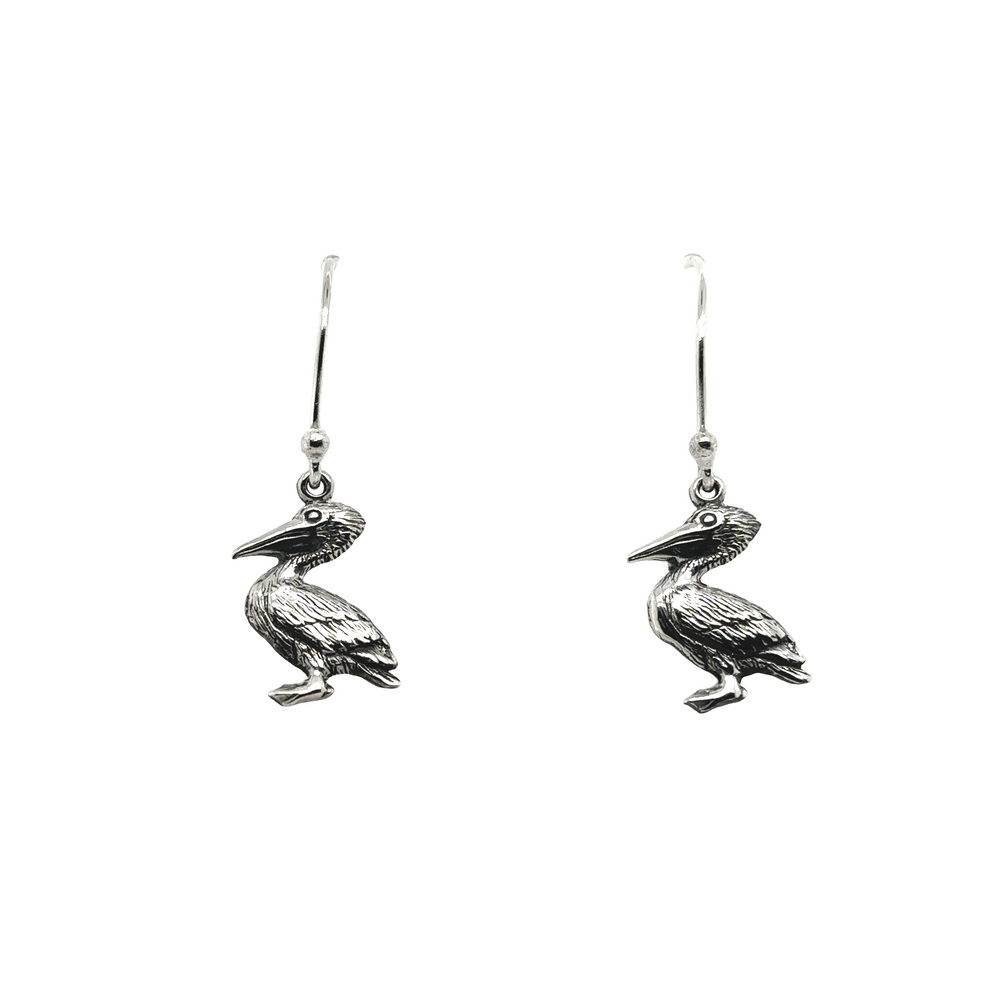 
                  
                    Featuring a pair of Super Silver Pelican Earrings crafted from .925 silver, this exquisite piece is showcased against a pristine white background.
                  
                