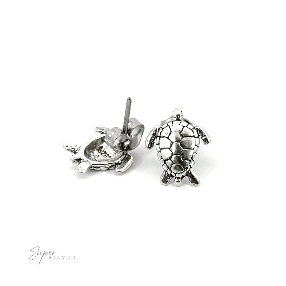 A pair of Sea Turtle Studs on a white background.