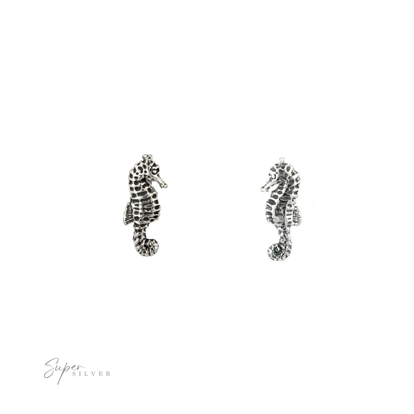 Delicate Seahorse Studs featuring intricate ocean creature details, showcased against a clean white background.