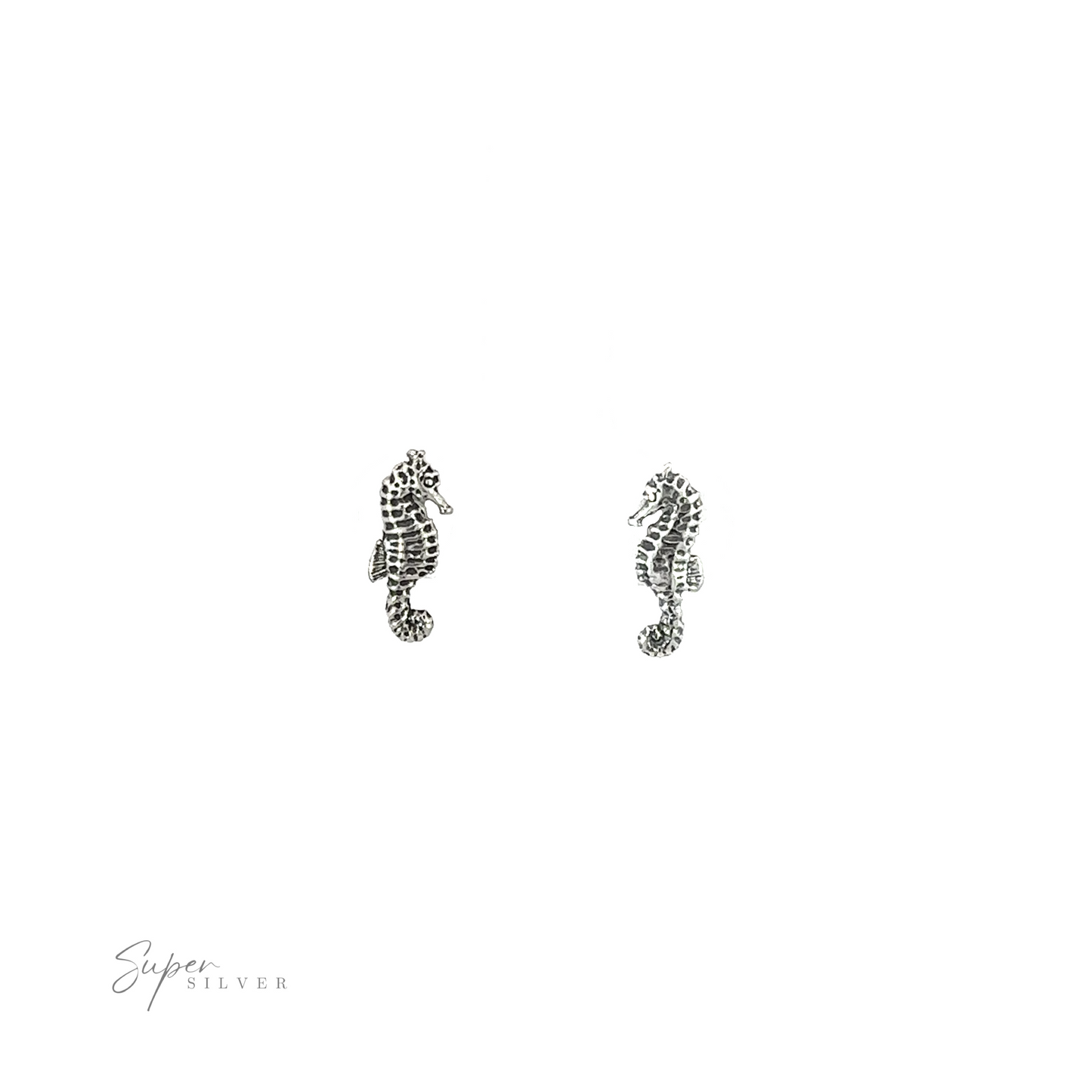 
                  
                    Delicate details showcase a pair of Seahorse Studs, ocean creatures that elegantly adorn against a serene white background.
                  
                