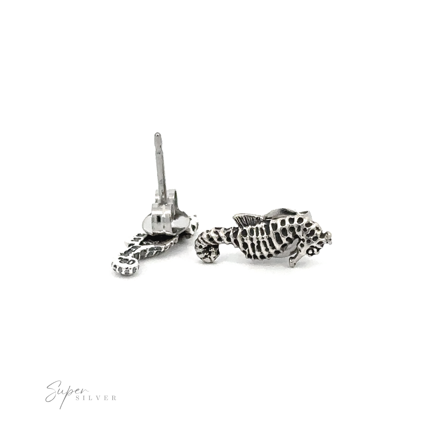 Delicate details of Seahorse Studs on a white background.