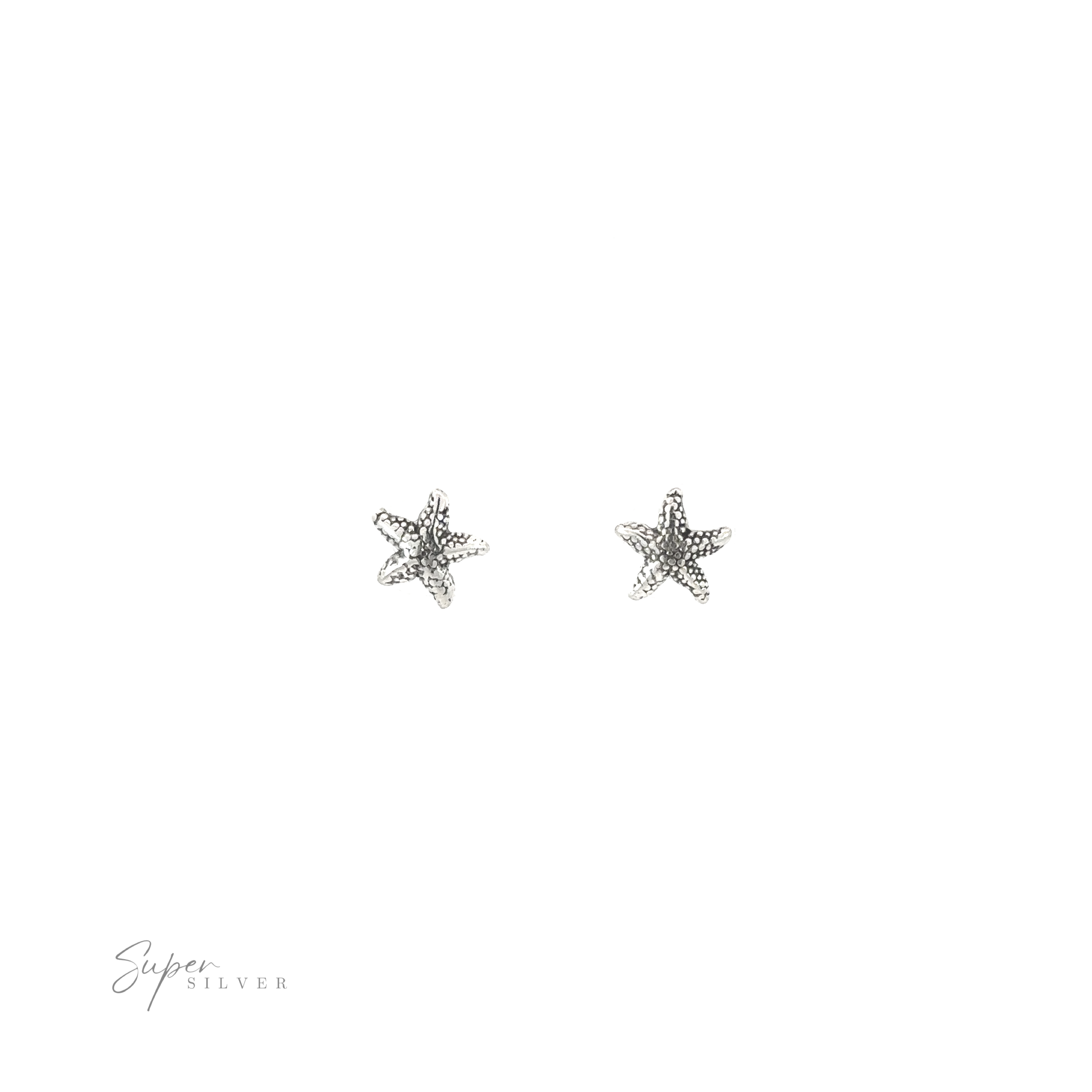 A pair of Star Fish Studs on a white background.