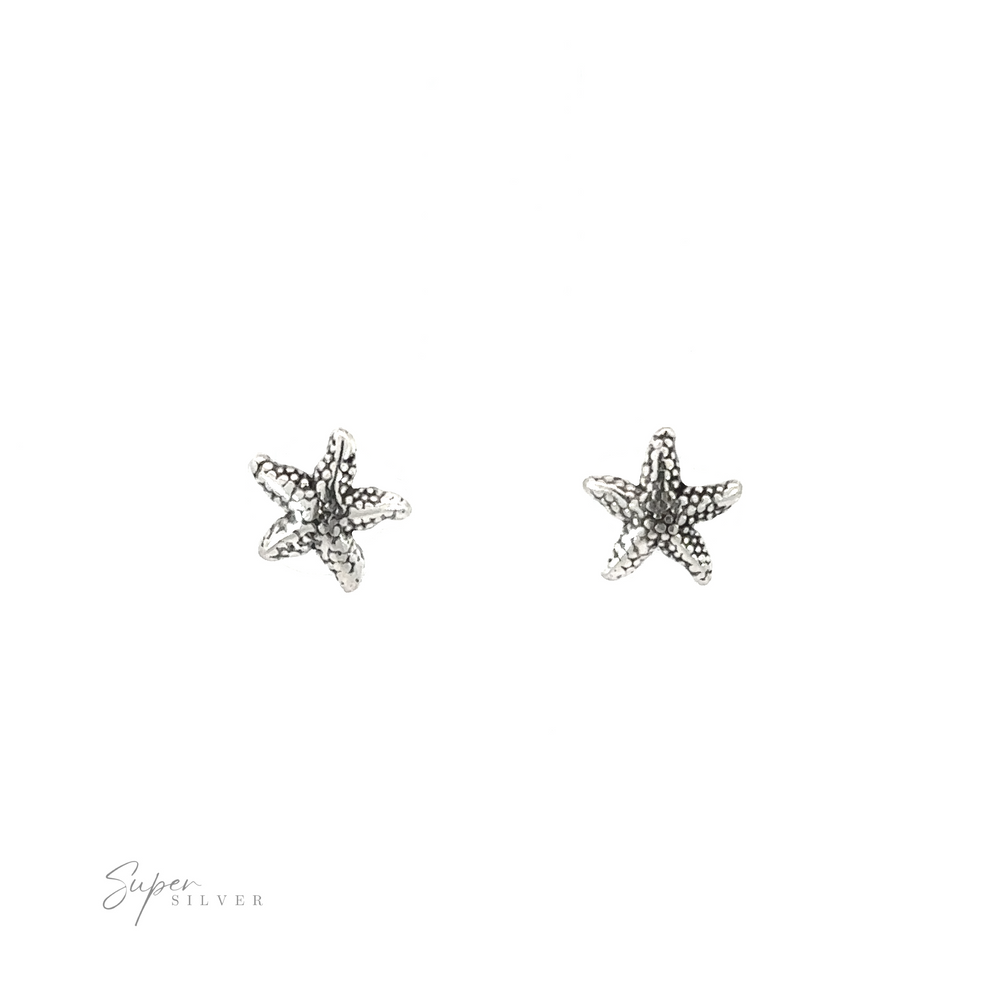A pair of Star Fish Studs, perfect for coastal living or beach shore enthusiasts, showcased on a pristine white background.