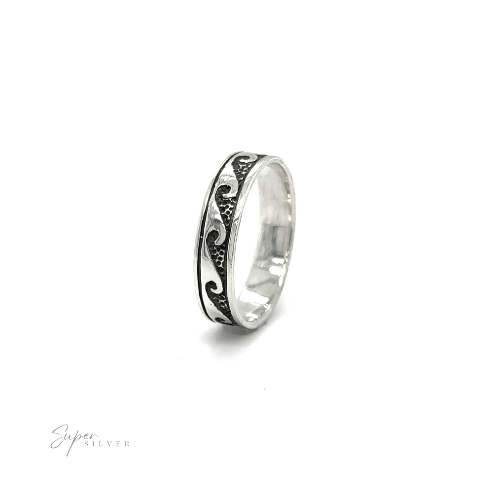 
                  
                    A mens silver 4mm Wave Band with black and white swirls reminiscent of the ocean in Santa Cruz.
                  
                