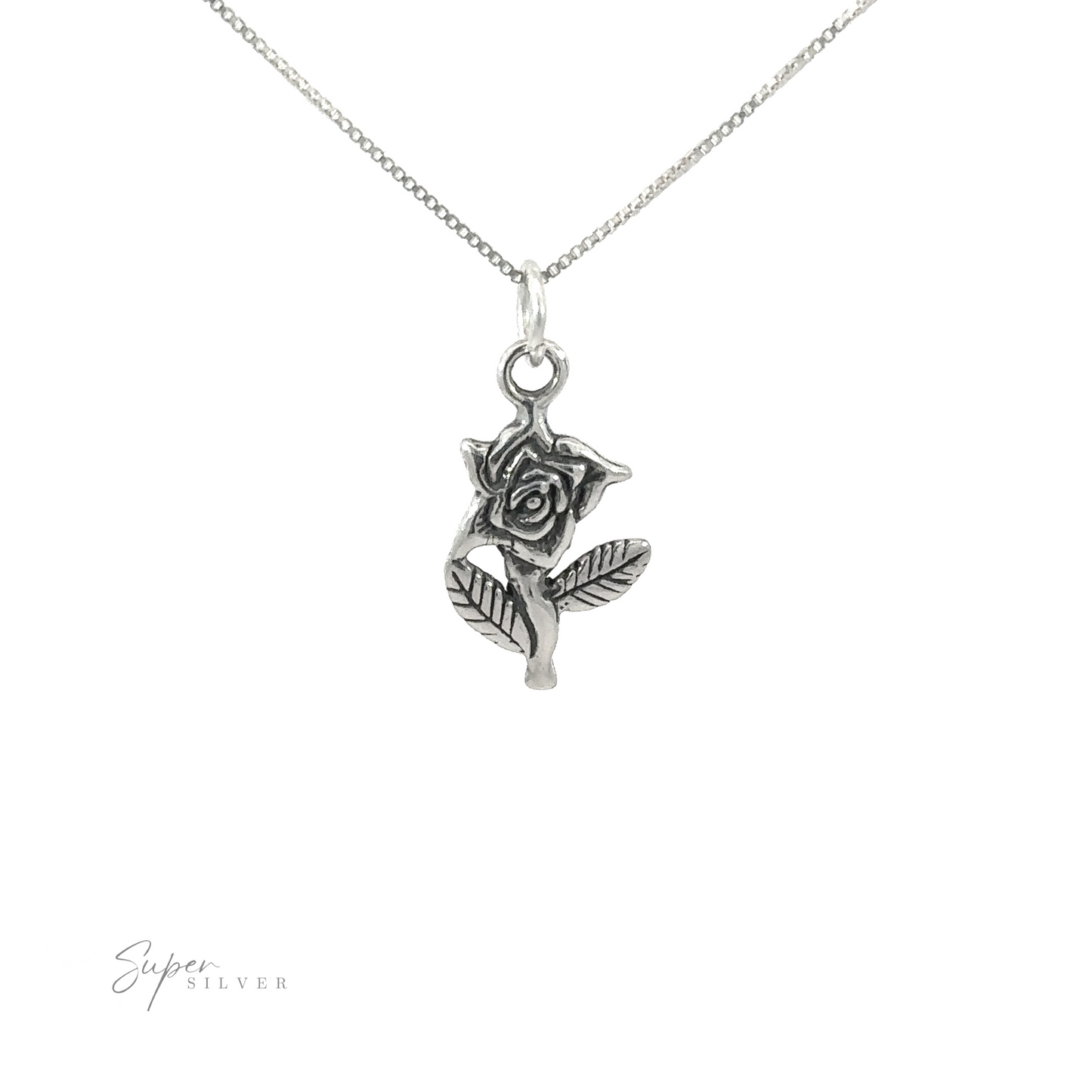 A dainty .925 Sterling Silver Rose Charm on a chain.
