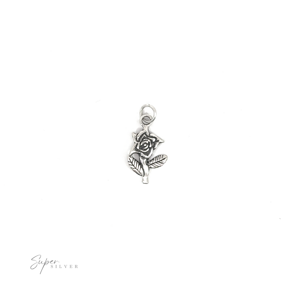 
                  
                    A small Rose Charm on a white background.
                  
                