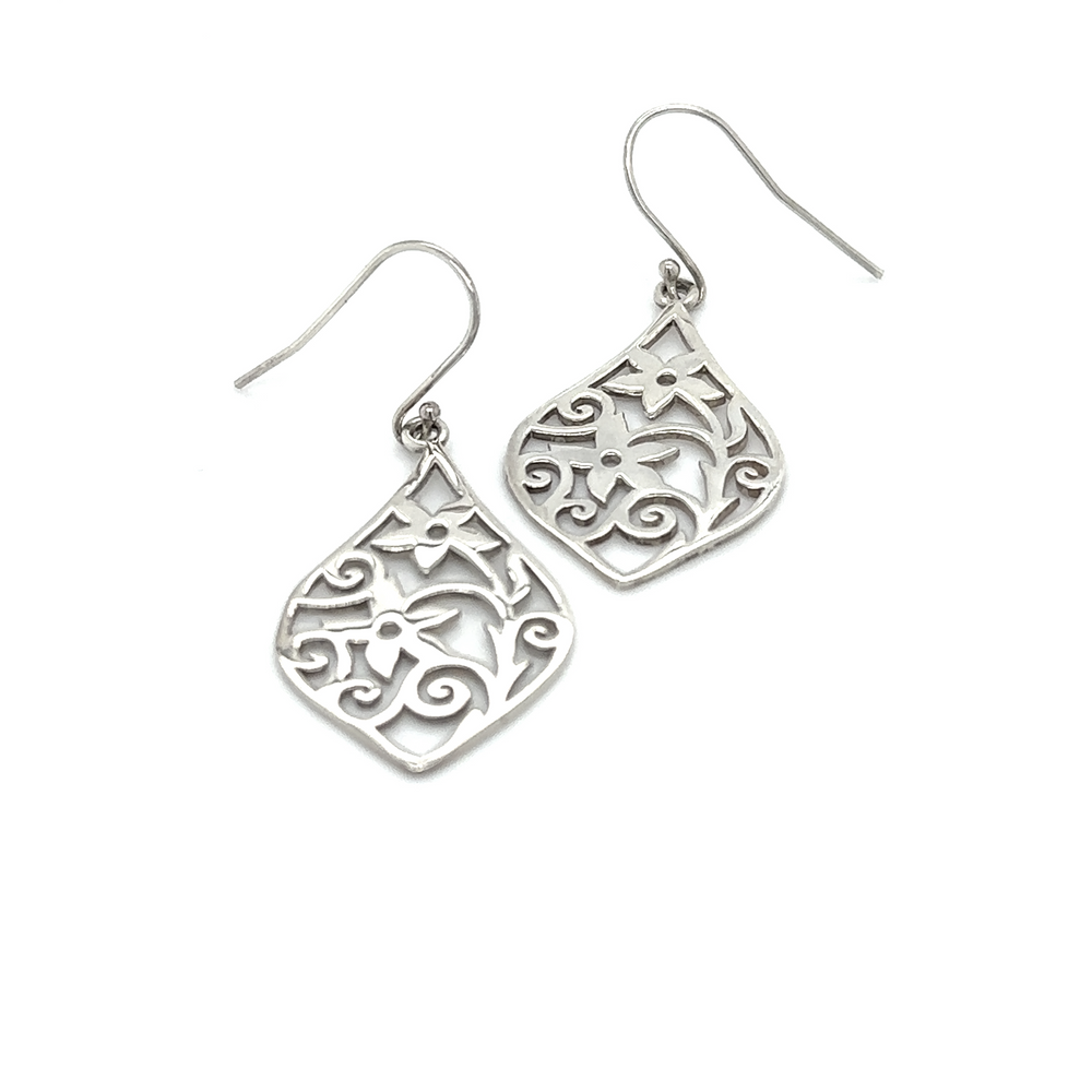 A pair of Floral Scene Earrings by Super Silver with an intricate floral design.