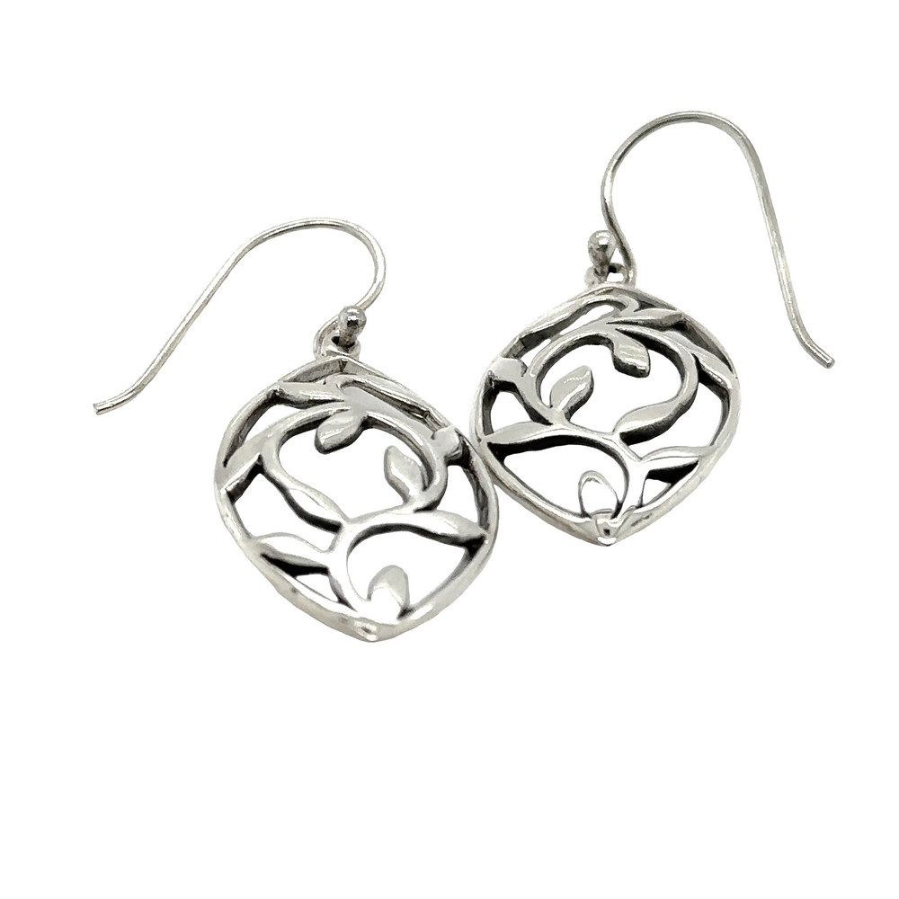 
                  
                    A pair of Marquise Shaped Earrings with Leaves by Super Silver with a swirl design.
                  
                