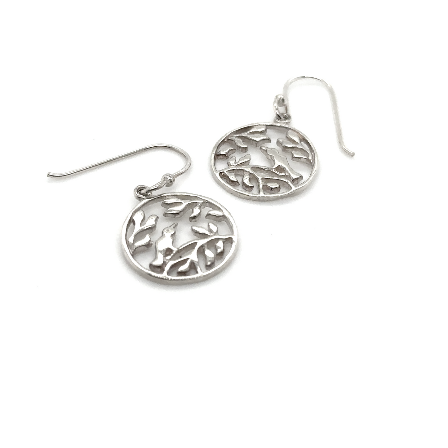 
                  
                    A pair of Super Silver Circle Shaped Earrings with Nature Scene.
                  
                