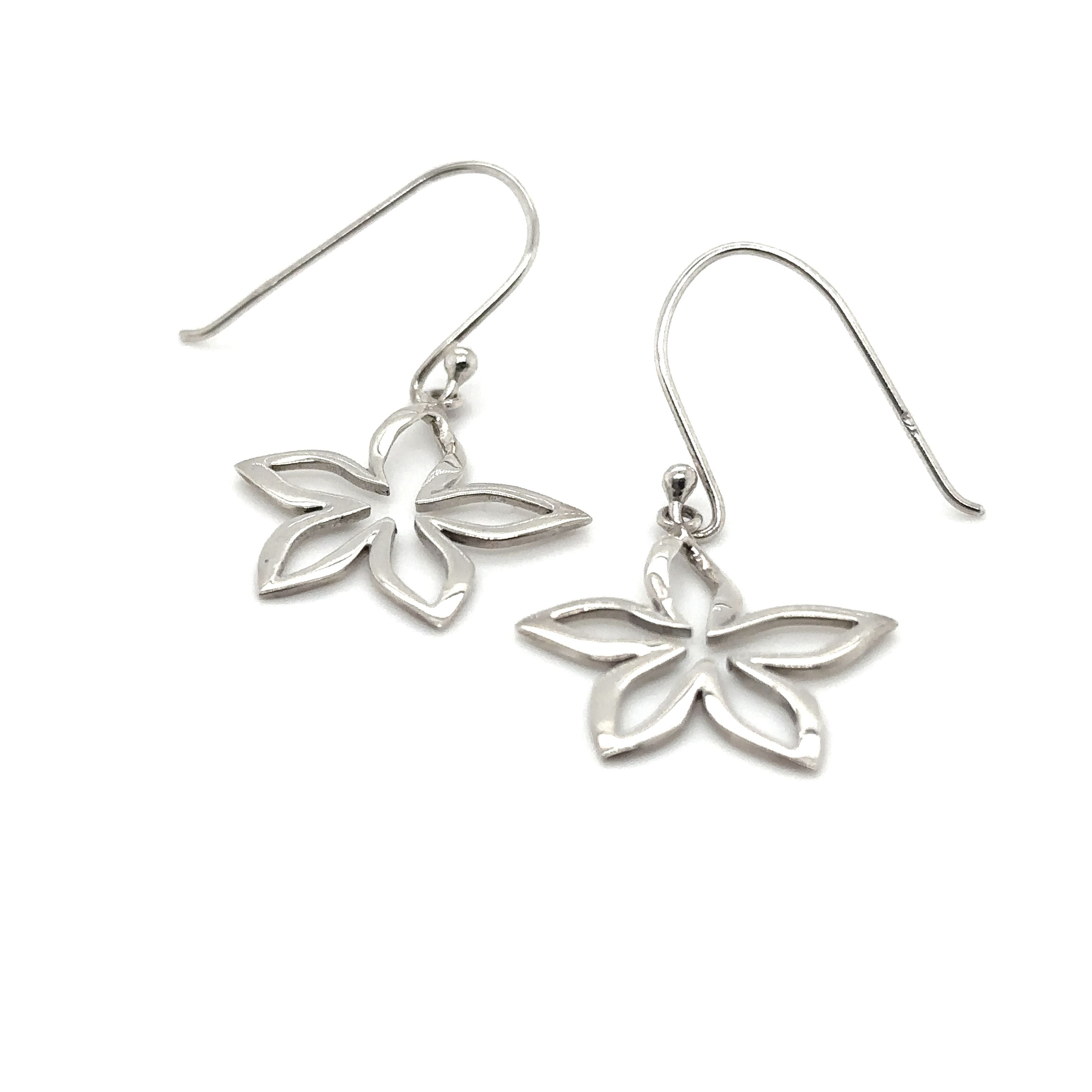 A pair of Super Silver Simple Open Flower Earrings on a white background.