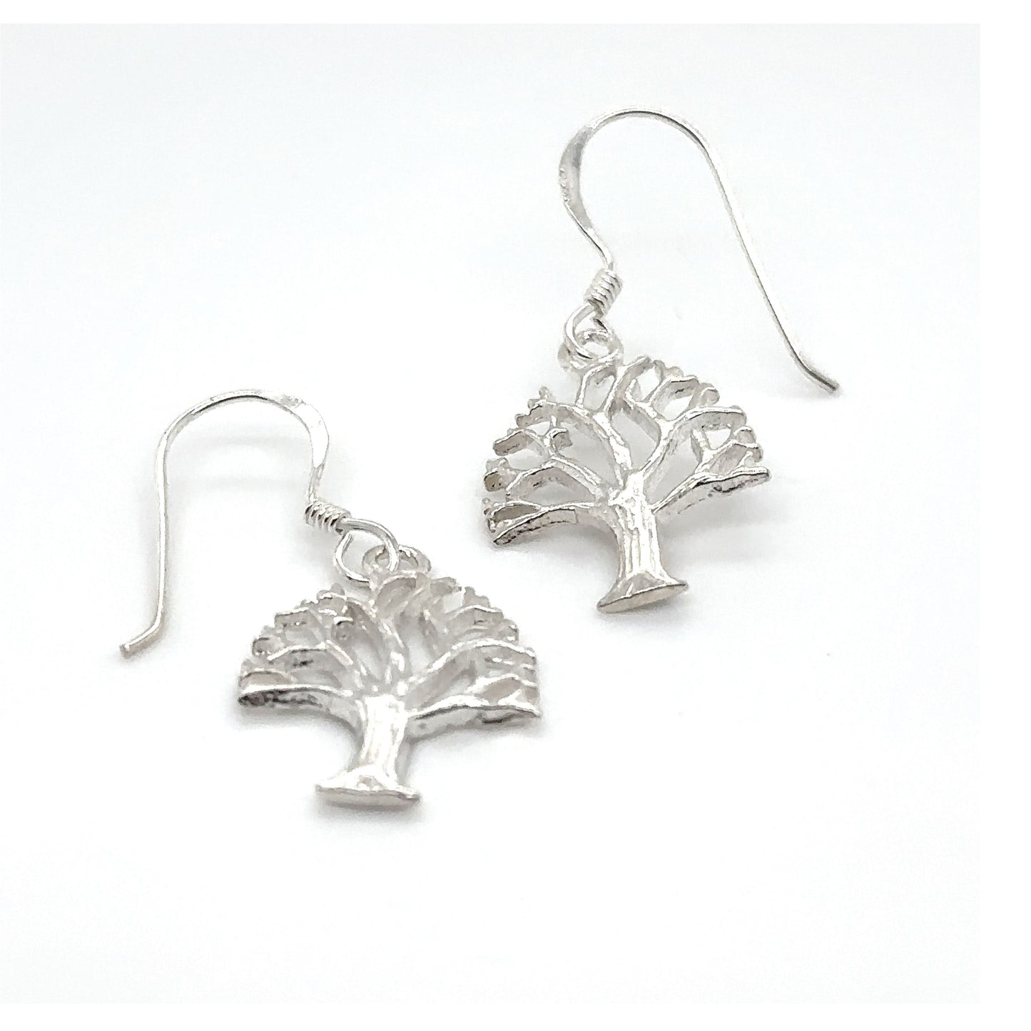 
                  
                    A pair of Super Silver Tree Of Life Earrings on a white background.
                  
                