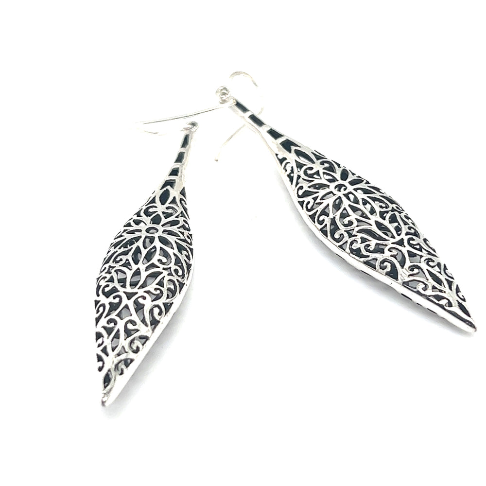 An intricate pair of Super Silver's Long Bali Inspired Filigree Puffed Earrings.