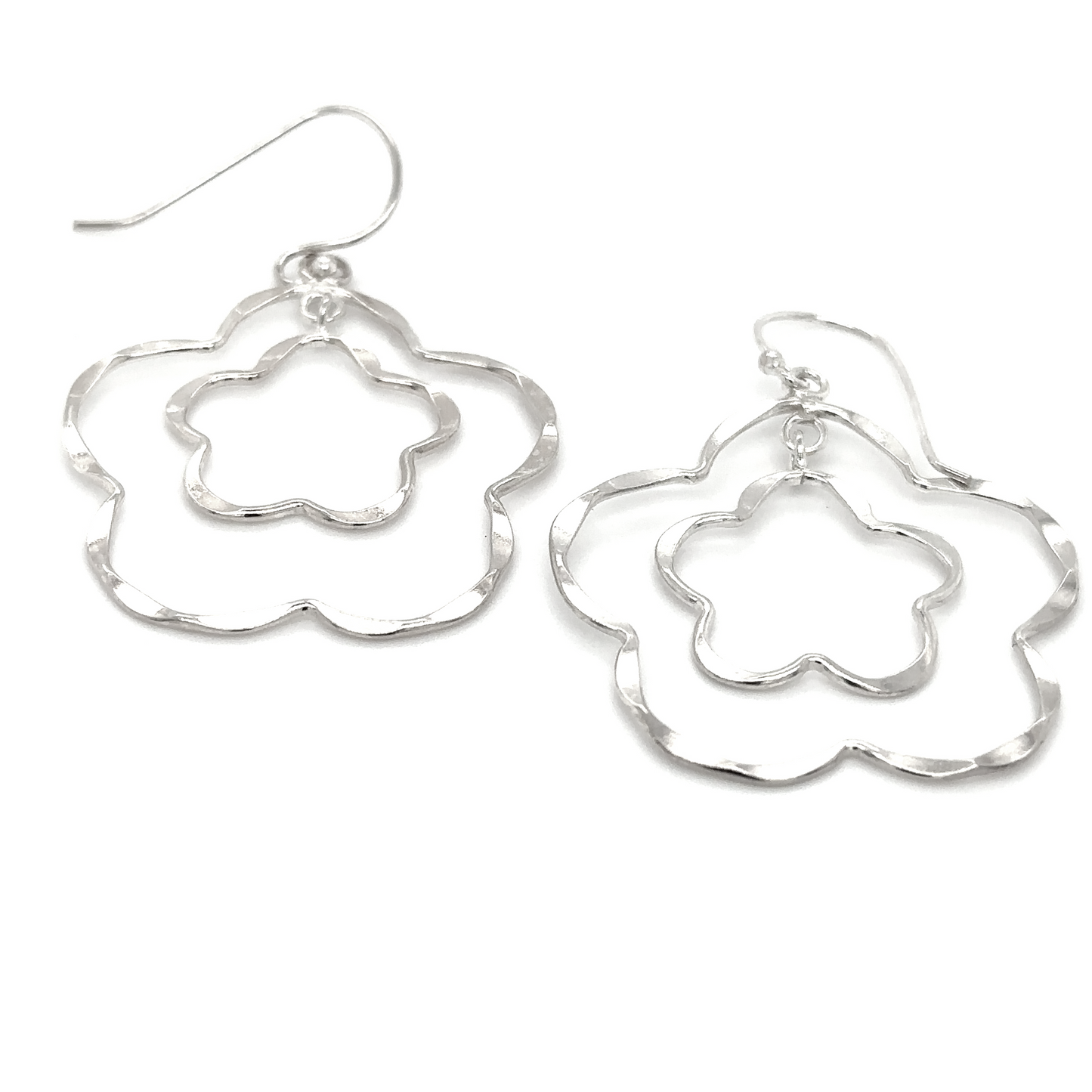
                  
                    A pair of Super Silver Flower Outline Earrings on a white background.
                  
                