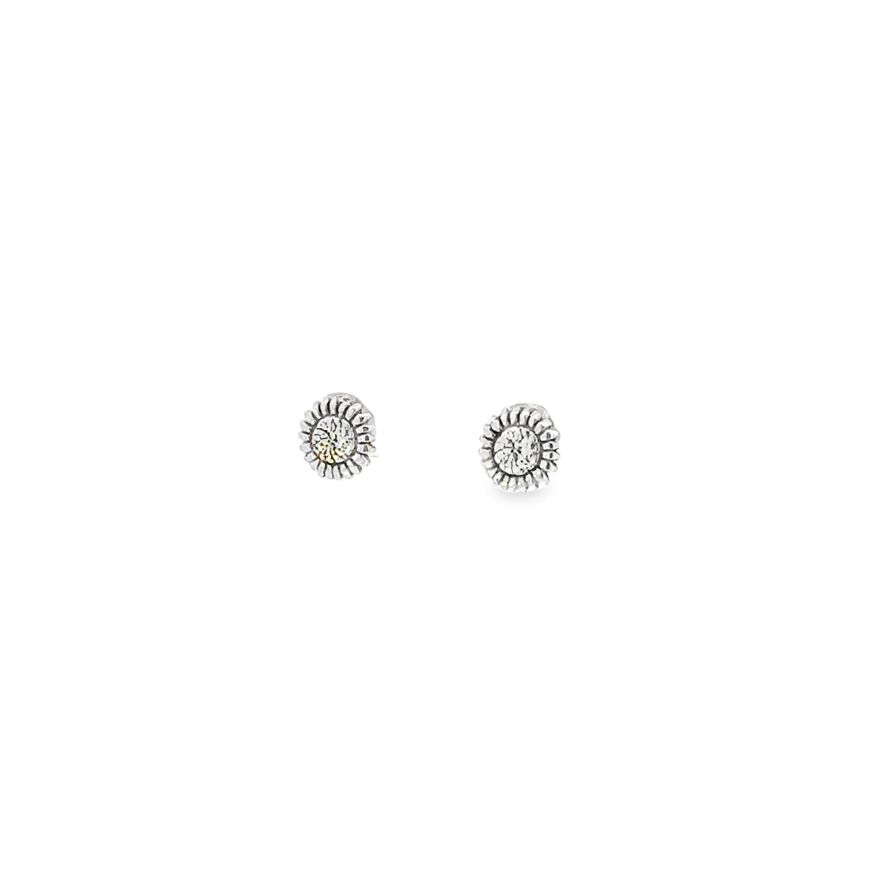 A pair of Sunflower Studs, a small addition to elevate an everyday casual look, set against a white background.
