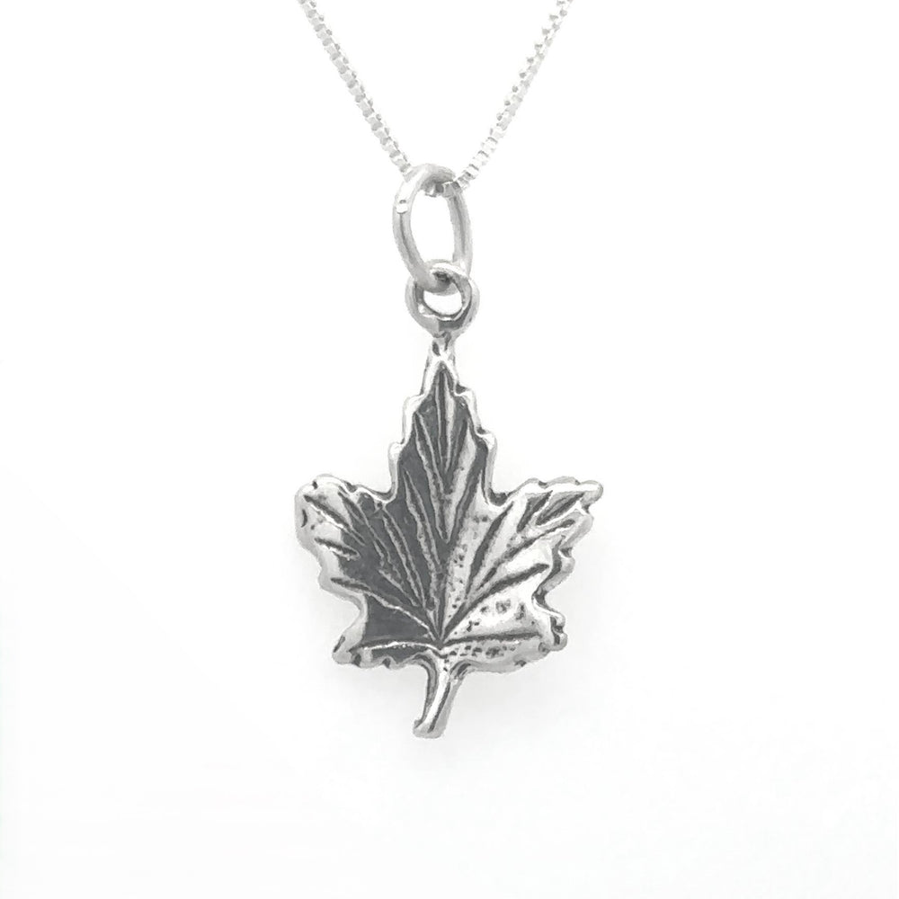 
                  
                    Tiny Maple Leaf Charm
                  
                