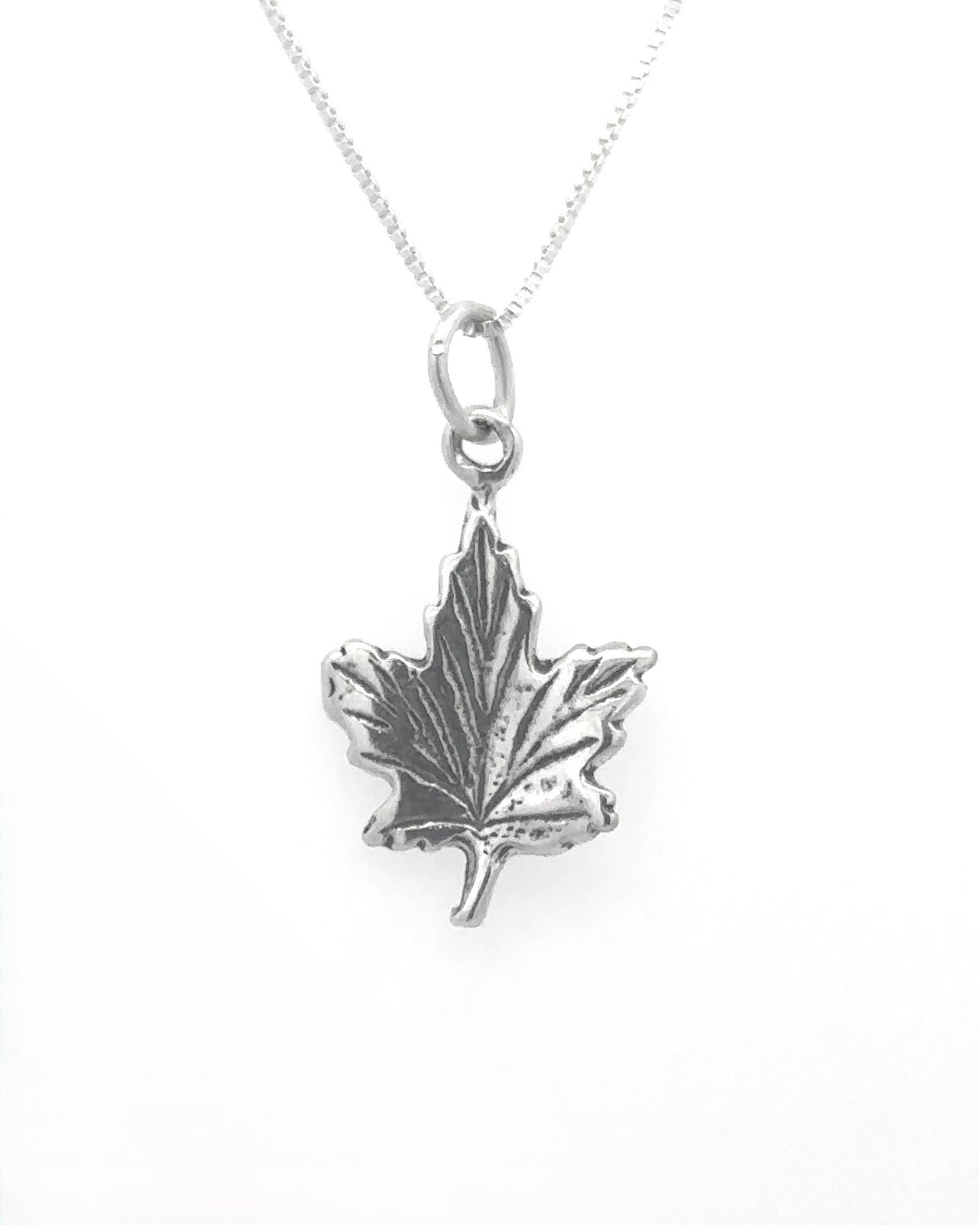 
                  
                    Tiny Maple Leaf Charm
                  
                