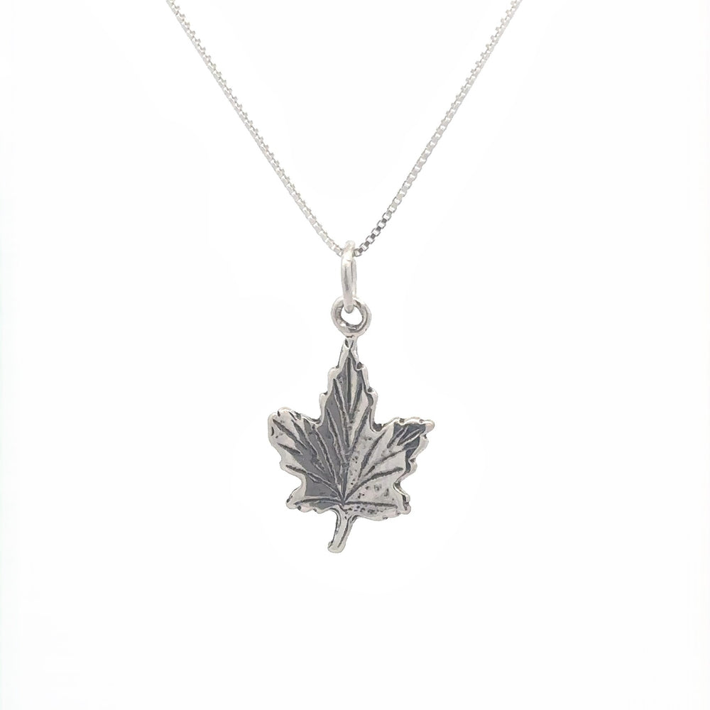 
                  
                    Sterling silver necklace featuring the Tiny Maple Leaf Charm, perfect for embracing autumn style.
                  
                