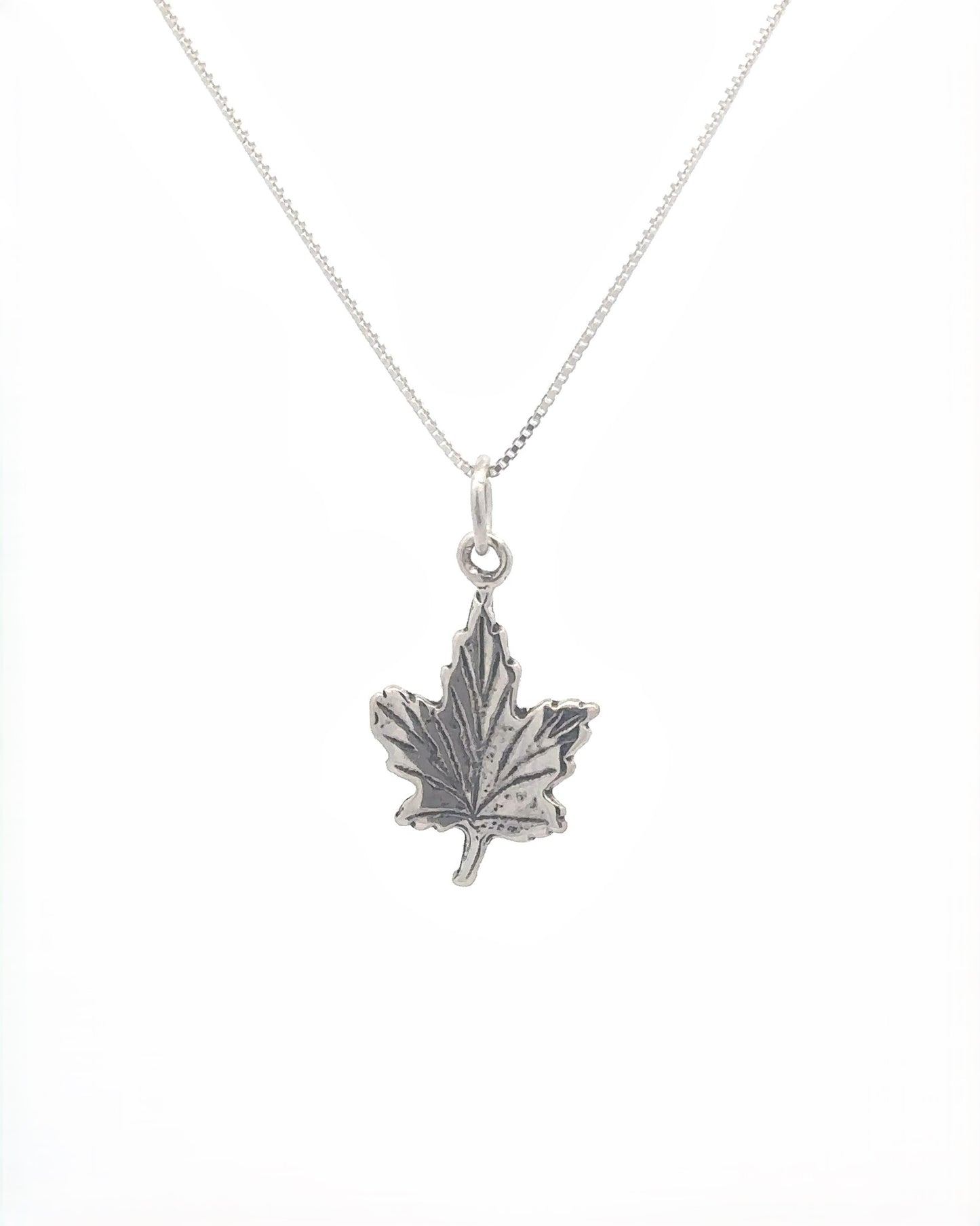 
                  
                    Sterling silver necklace featuring the Tiny Maple Leaf Charm, perfect for embracing autumn style.
                  
                