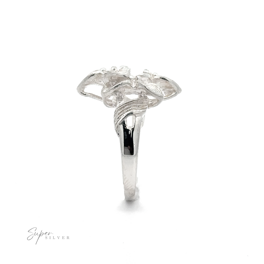 
                  
                    A Silver Ring with Three Flowers displayed against a white background.
                  
                