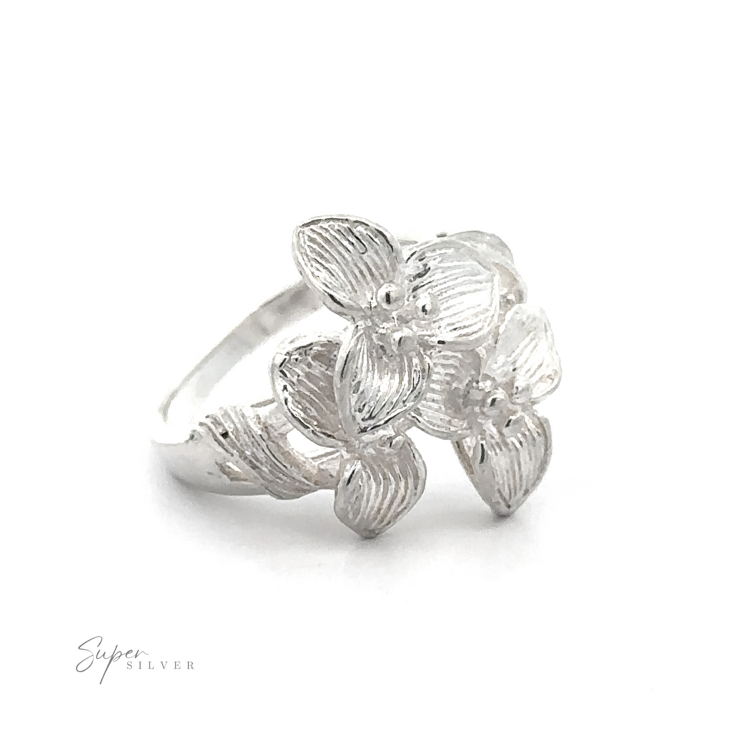 Sterling Silver Ring with Three Flowers on a White Background.