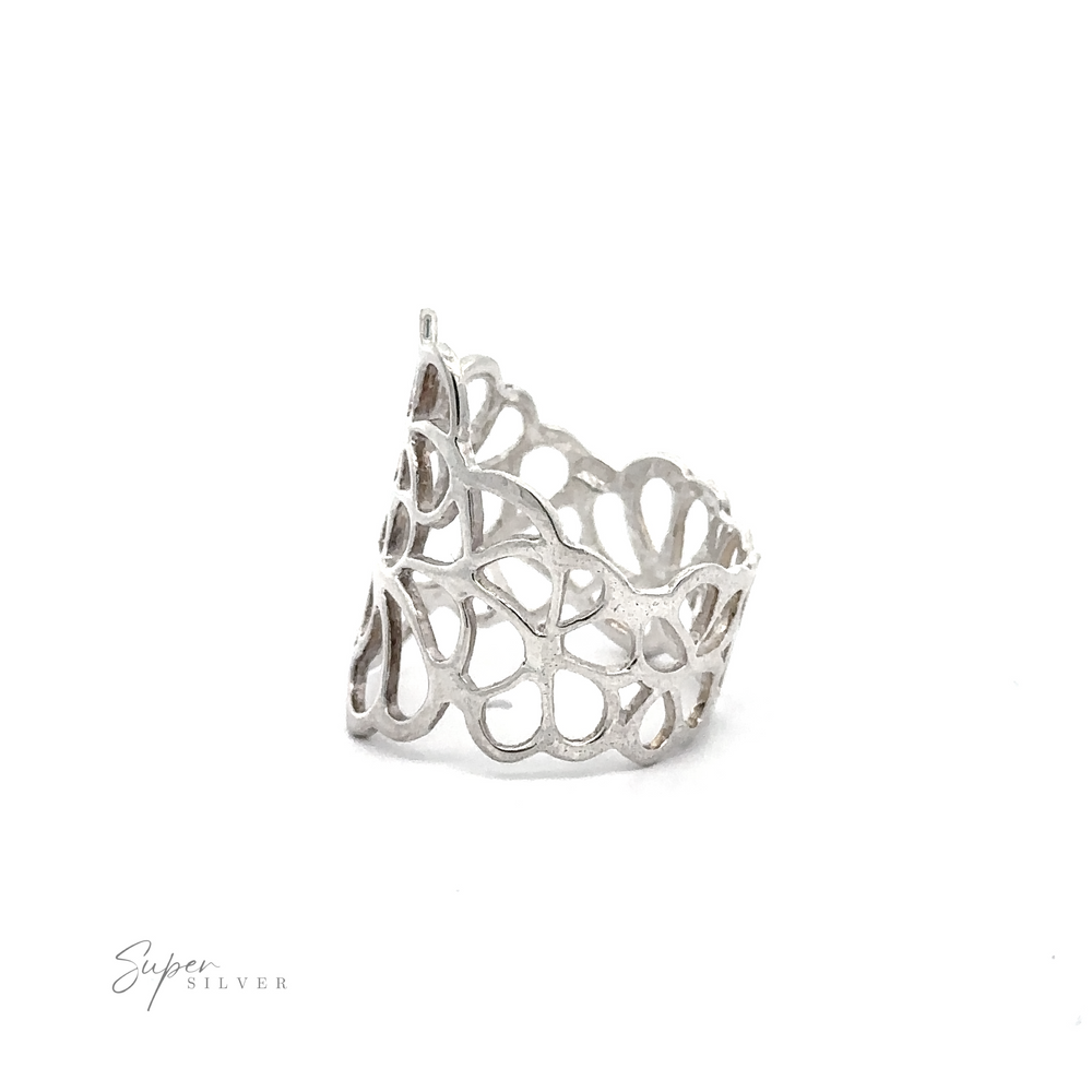 
                  
                    A .925 Sterling Silver Wide Ring with Cut Out Flowers and a wider band.
                  
                
