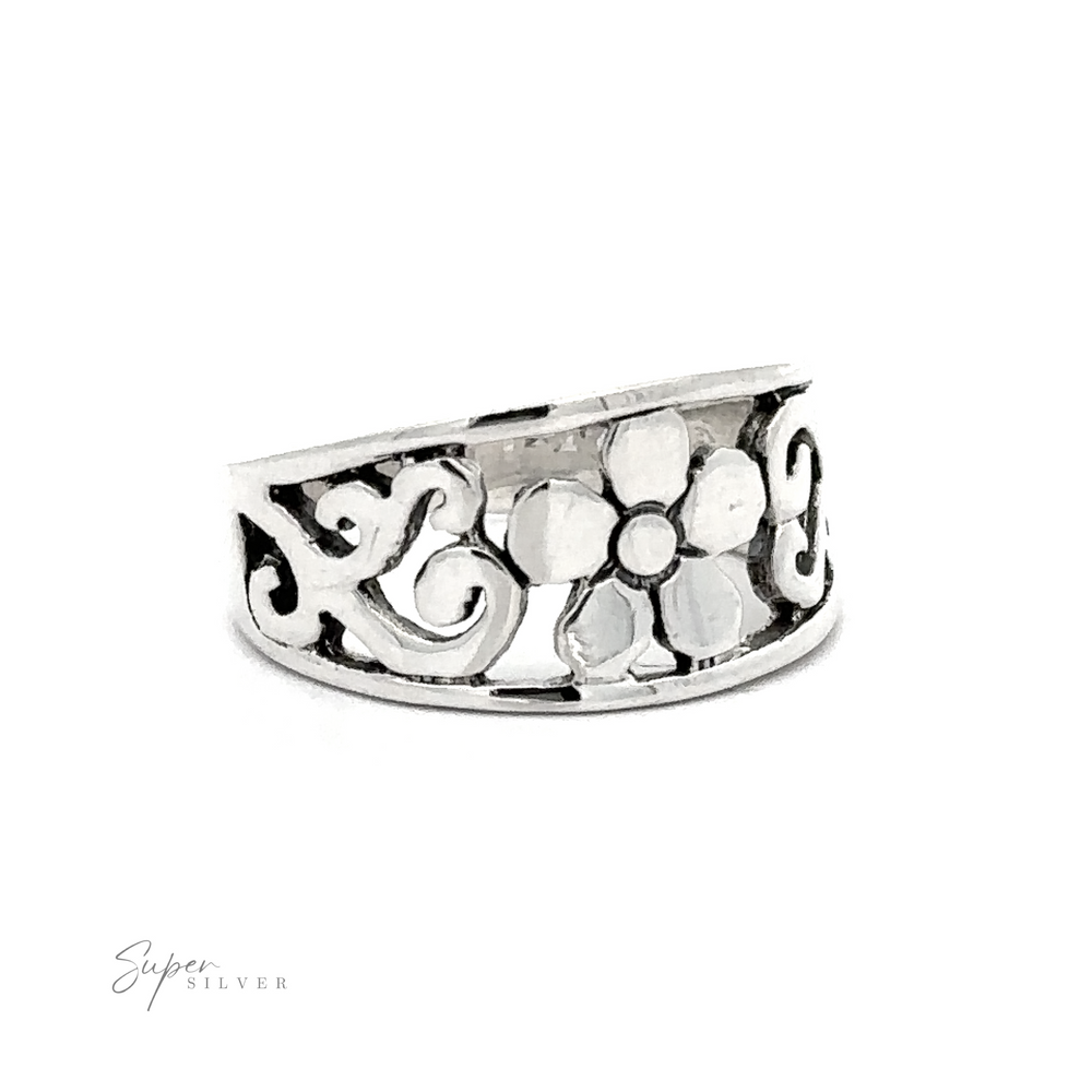 
                  
                    A Flower Ring With Tapered Band and Swirls with a floral design featuring daisies.
                  
                