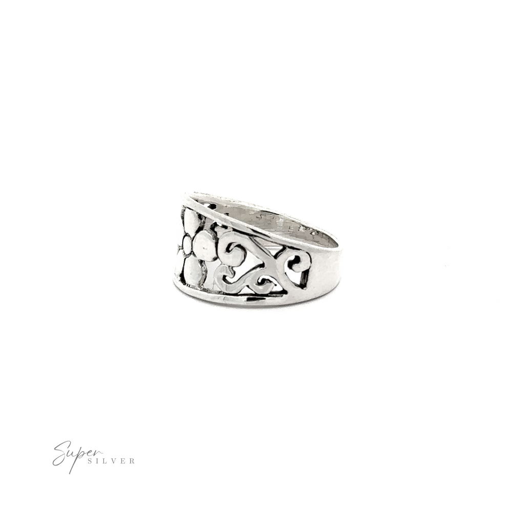 
                  
                    A Flower Ring With Tapered Band and Swirls with an ornate design.
                  
                