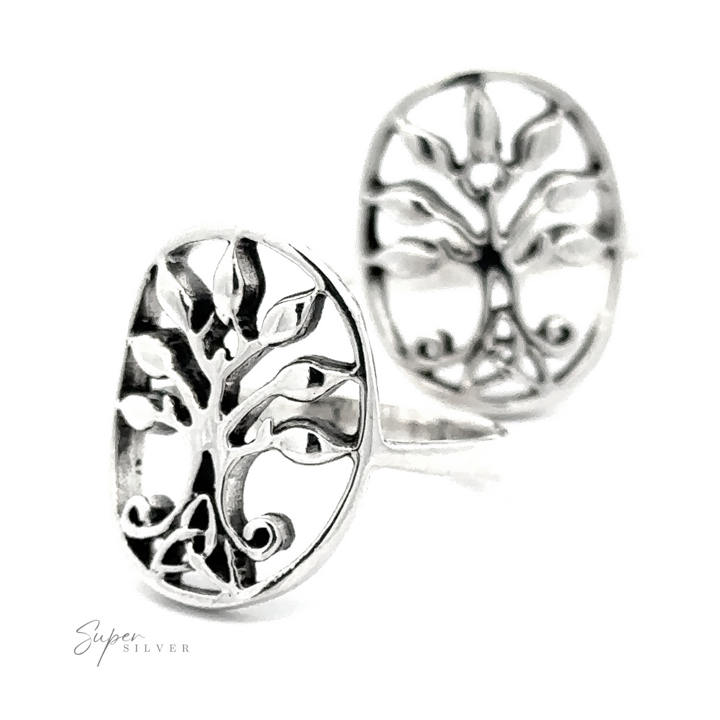 A pair of sterling silver Tree of Life Ring With Celtic Trinity Knots displayed against a white background.