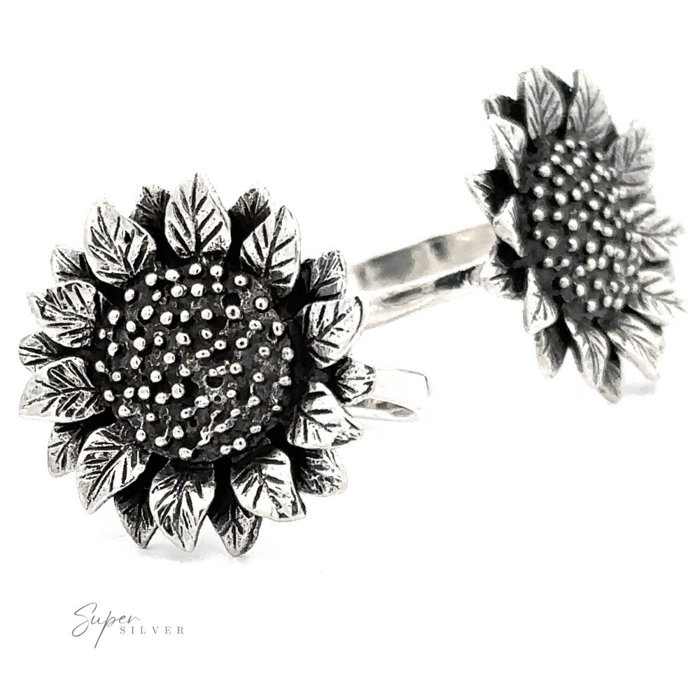 Large Sunflower Ring-shaped sterling silver ring and stud earrings with substantial setting and detailed petal and center textures, displayed on a white background with the logo "super silver.