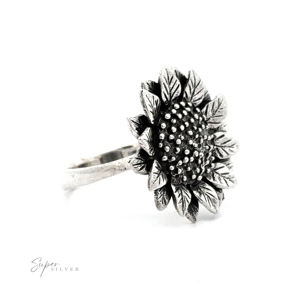 
                  
                    Sentence with product name: Large Sunflower Ring shaped like a sunflower with detailed petals and textured center on a white background.
                  
                