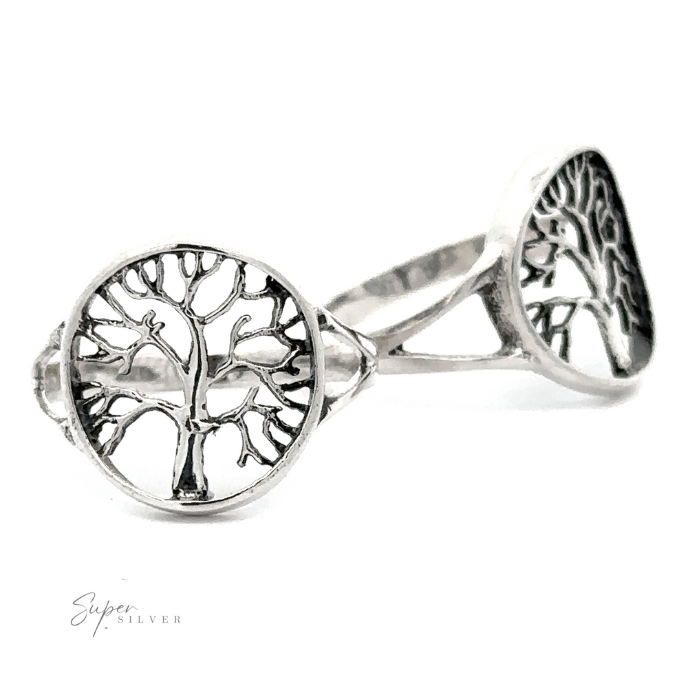 Tree Of Life Ring featuring a Tree of Life design on the face, placed on a white background.