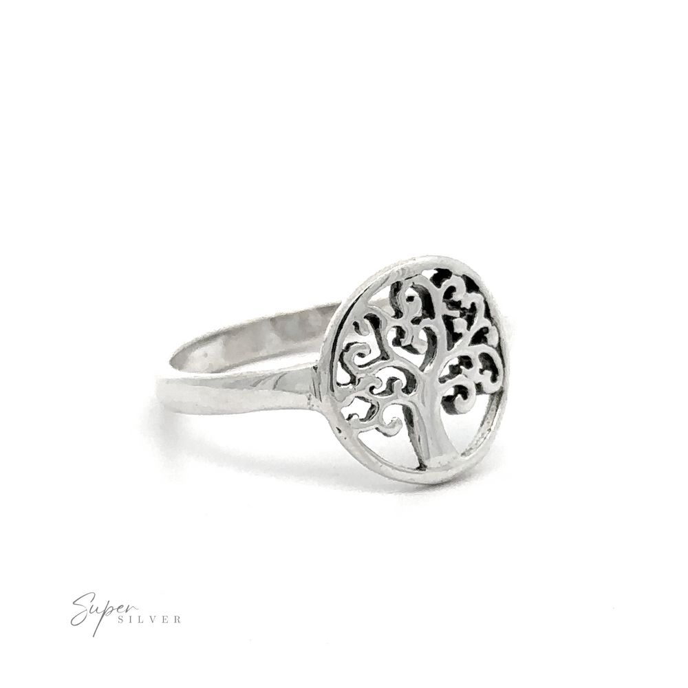 A sterling silver Tree Of Life ring with swirling branch design on a white background.