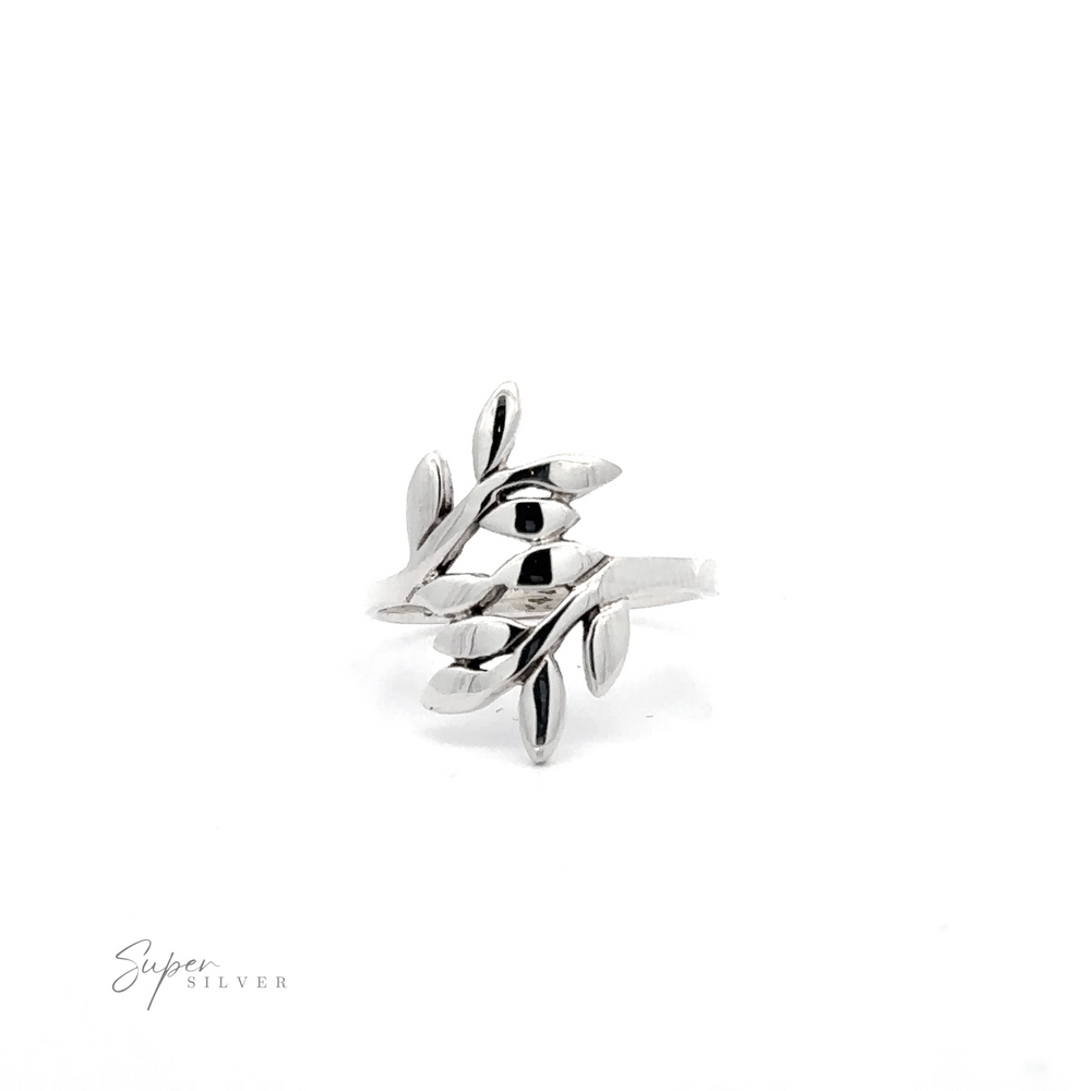 Silver Olive Branch Ring, designed with an olive branch motif, positioned on a plain white background.