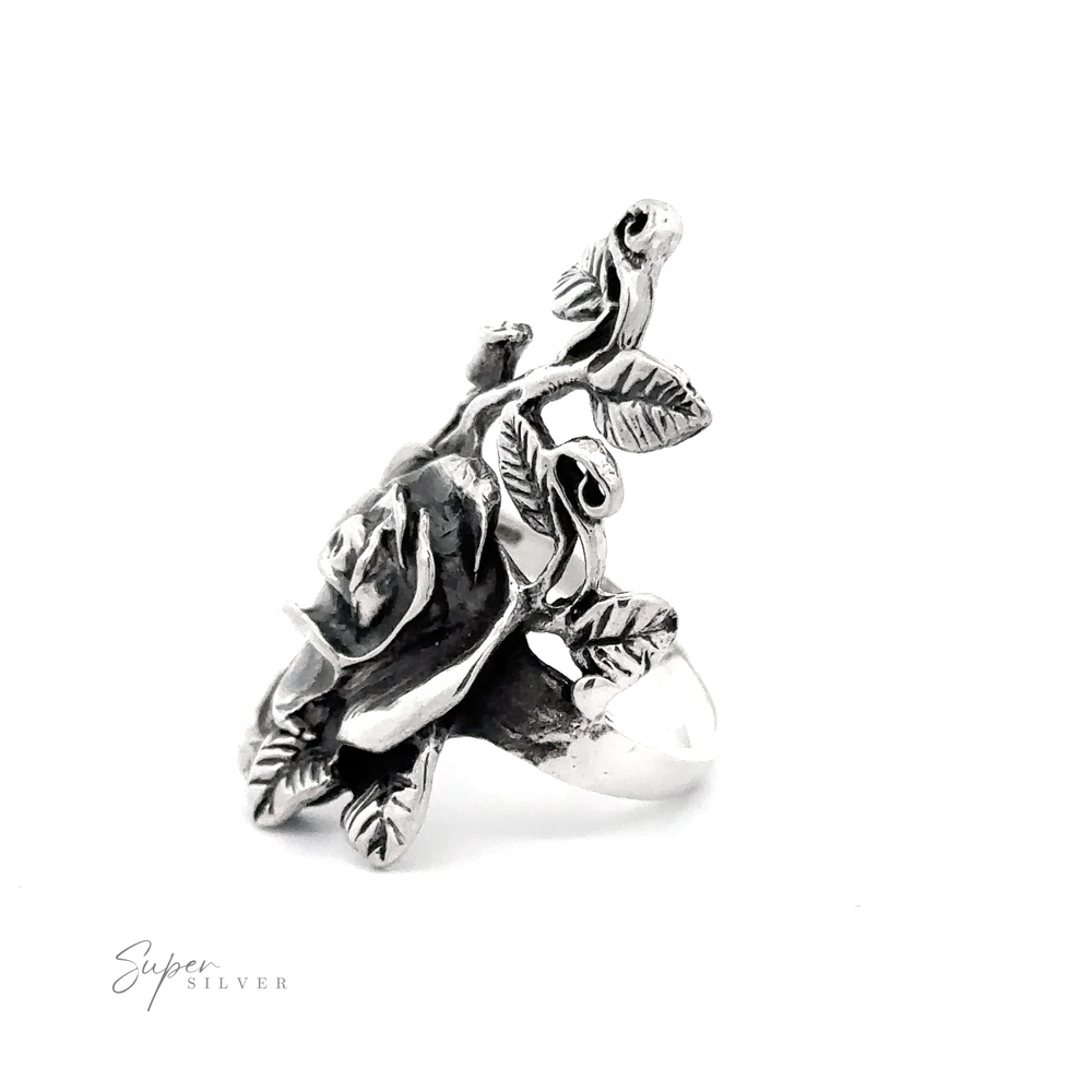 A striking rose and vine ring featuring a sculpted turtle design.
