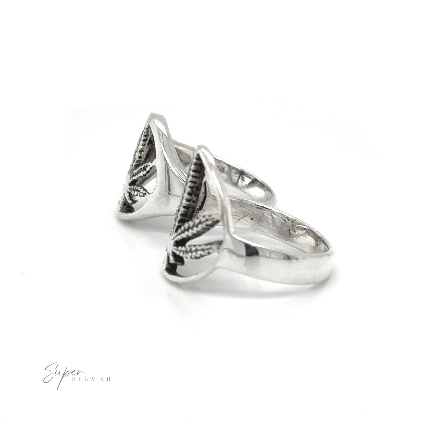 
                  
                    Outlined Mary Jane Leaf rings emanate Stoner vibes resting on a peaceful white background.
                  
                
