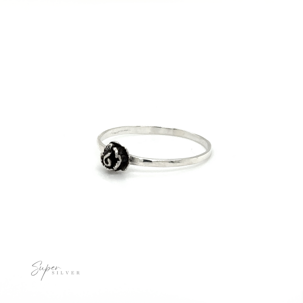 
                  
                    A Dainty Rose Ring with a floral design.
                  
                