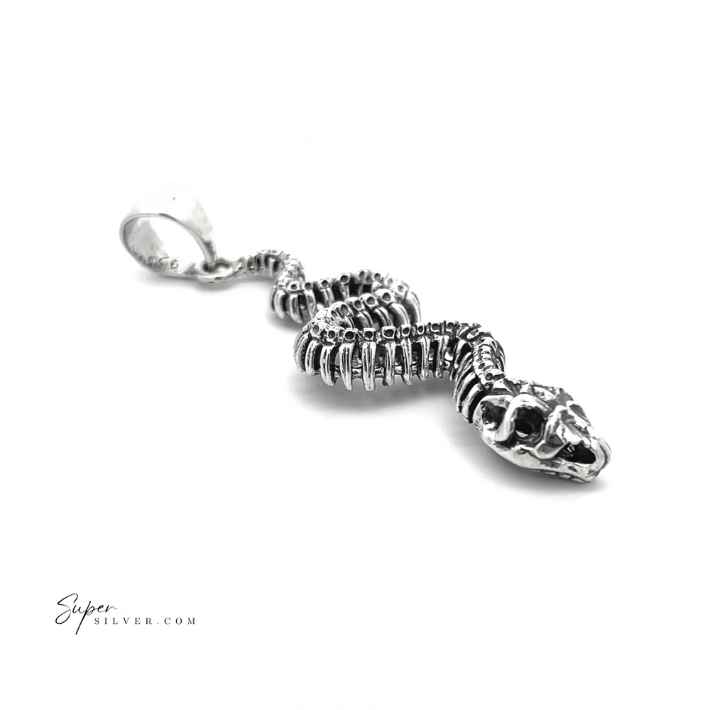 
                  
                    This artisan collection piece, the Haunting Snake Skeleton Pendant, showcases a coiled silver snake design with intricate scales against a plain white background. It is part of our transformation jewelry line, celebrating renewal and change.
                  
                