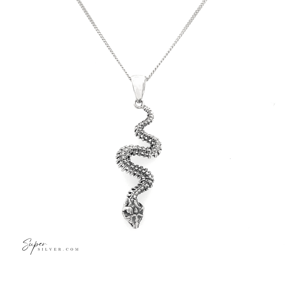 
                  
                    Experience the charm of our Haunting Snake Skeleton Pendant, gracefully suspended on a chain necklace against a pristine white background. As part of our artisan collections, this piece represents transformation jewelry at its finest.
                  
                