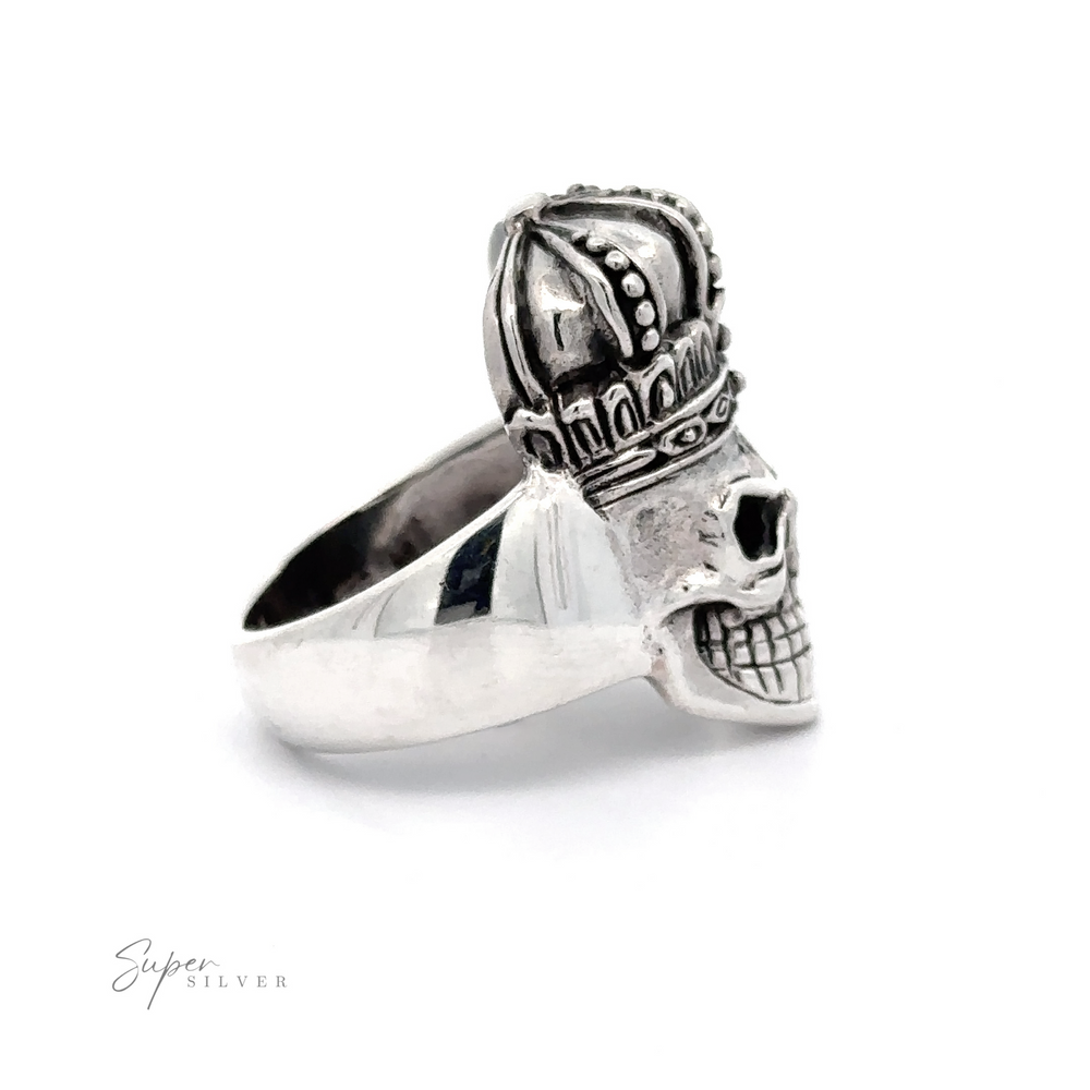
                  
                    A bold and intricate Skull King Ring featuring a detailed skull wearing a king's crown. The silver ring boasts the words "Super Silver" lightly inscribed in the lower left corner.
                  
                