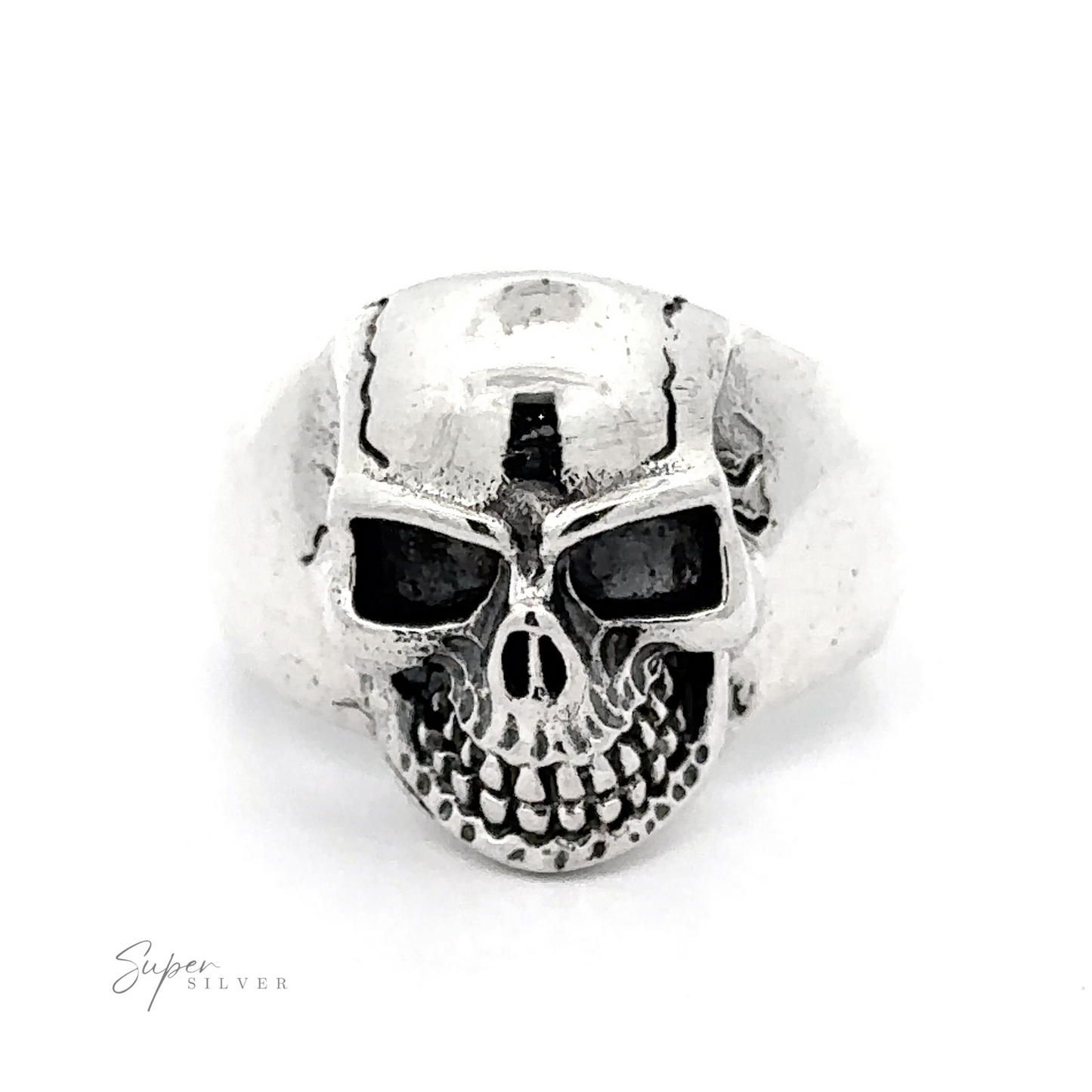 
                  
                    A bold accessory, this Detailed Veined Skull Statement Ring features a detailed veined skull with blackened eye sockets and nose cavity. The ring is branded with "Super Silver" in the bottom left corner.
                  
                